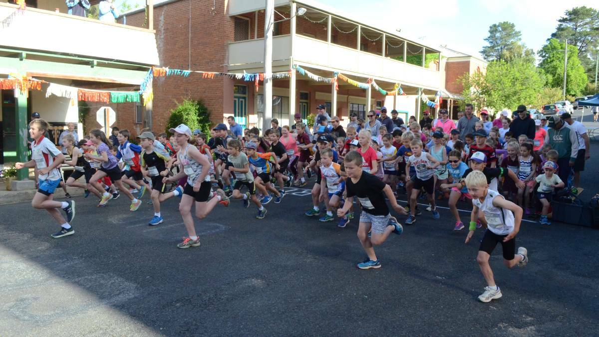 THE DASH: Runners take off for the Carcoar Cup dash. Photo: MARK LOGAN
