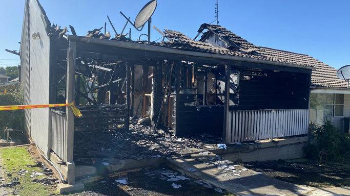 The back of the unit completely gutted by fire in Young. Picture by FRNSW Media