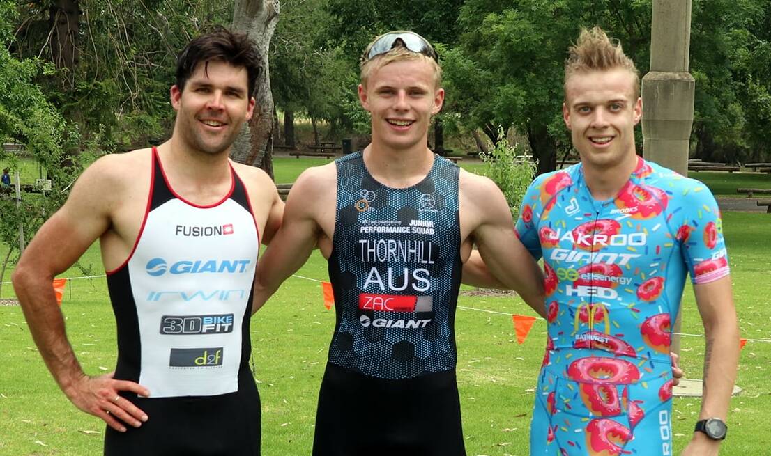 BIG THREE: Orange Piranhas star Rory Thornhill (centre) with Nick North and Josh Stapley, the second and third place getters respectively after the Mudgee race. Photo: ORANGE TRI-CLUB