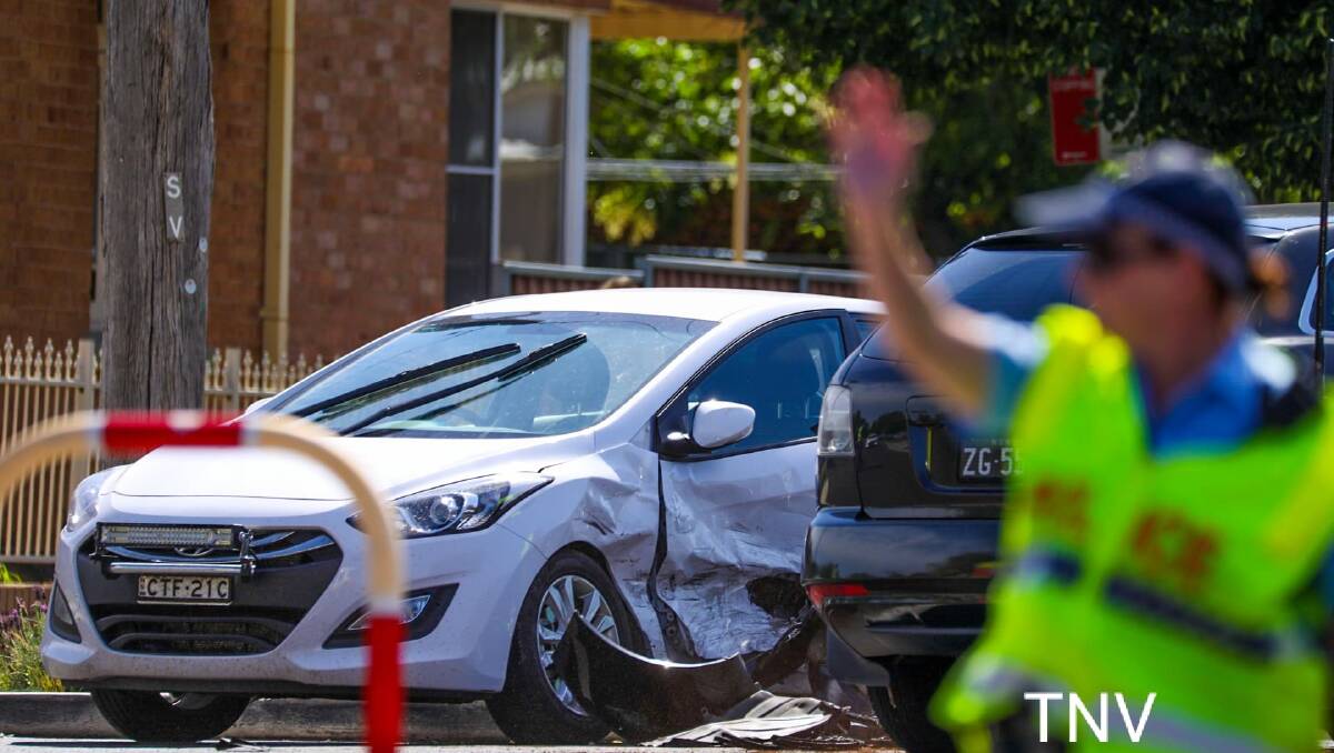 TWO-CAR SMASH: An accident on the corner of Lords Place and March Street closed the section of road for a short period. Photo: TROY PERSON/TNV
