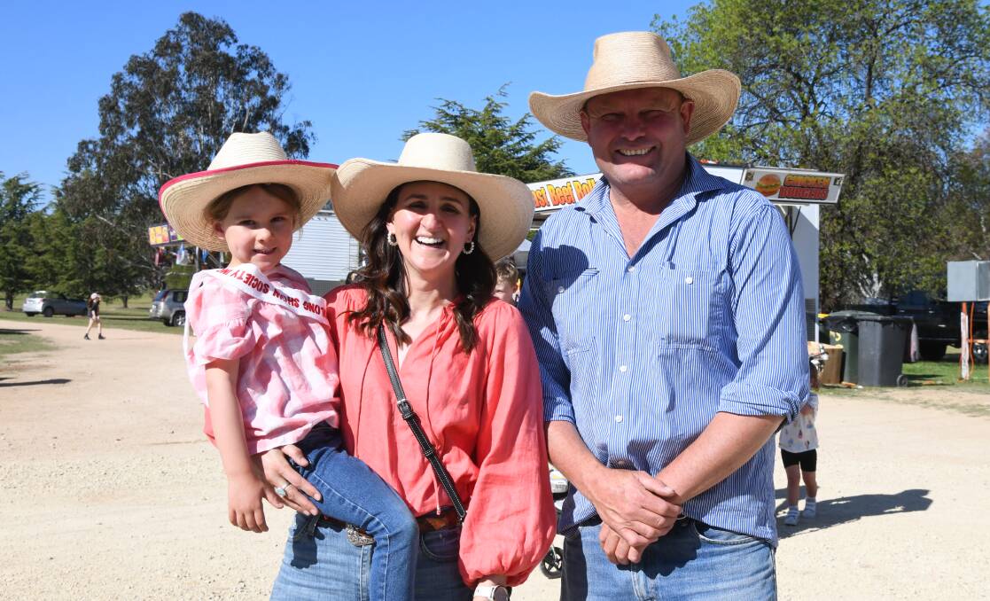 Georgia Redfern, Kate Redfern and Gordon Welsh don appropriate sun safety hats at the Molong show on the weekend. Picture by Carla Freedman