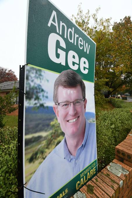 WHITE OUT: One of Andrew Gee's campaign signs was attacked by black marker near the roundabout on Summer and Woodward, but has since had those marks replaced by white-out. Photo: JUDE KEOGH