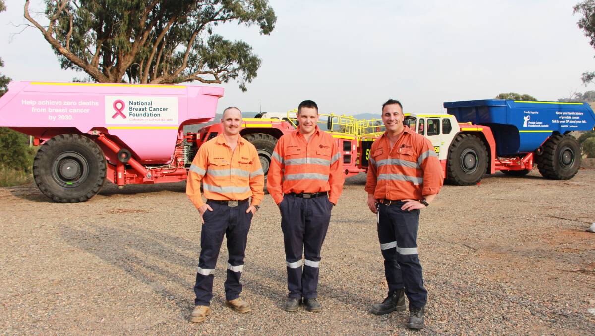 FOR A CAUSE: Mobile Fleet Maintenance manager Adrian Bush, Fleet Maintenance leading hand Stephen Roffe and Cadia East development mining superintendent David L'Estrange with the new tubs. Photo: CONTRIBUTED