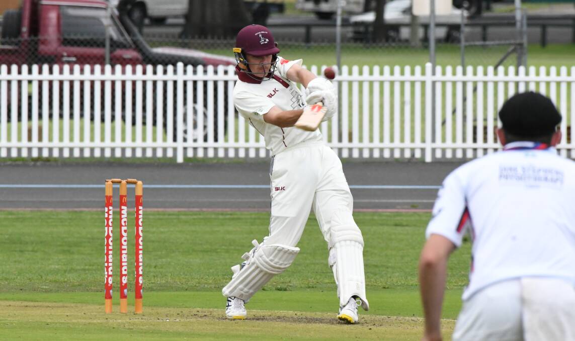 BANG: Not out Cavaliers' bat Bailey Ferguson takes on the City bowling attack. Photo: CHRIS SEABROOK