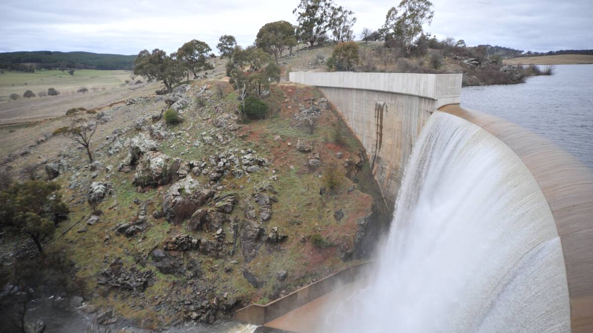 WHEN IT RAINS, IT STORES: Water pours over the wall at Suma Park on the back of a wet winter. Photo: JUDE KEOGH