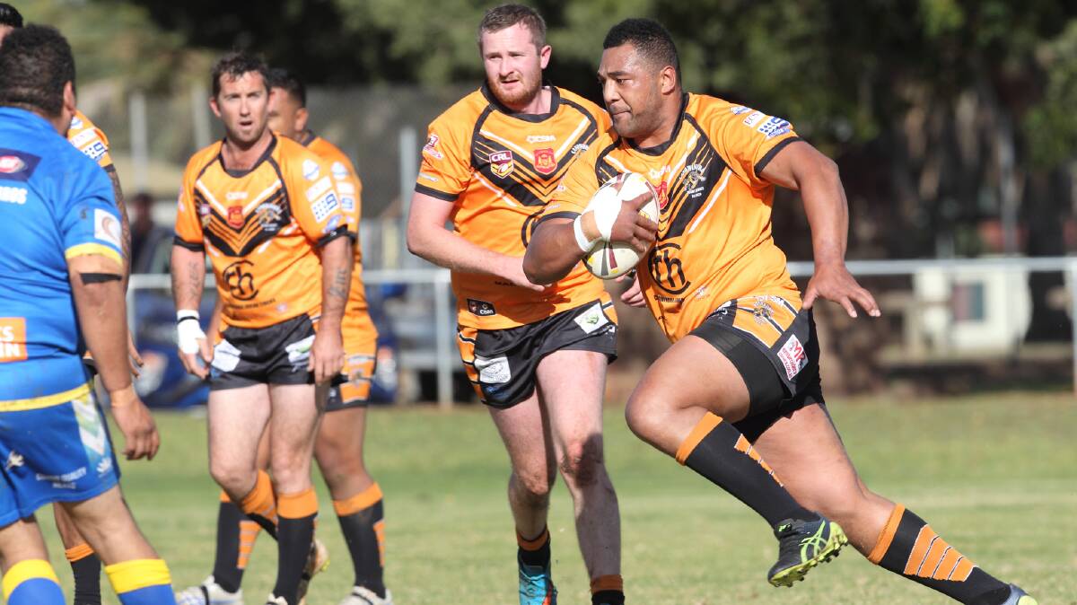 NO STOPPING ME: Tatafu Na'aniumotu charges the ball up for the Tigers during their big win over Condobolin. Photo: RS WILLIAMS