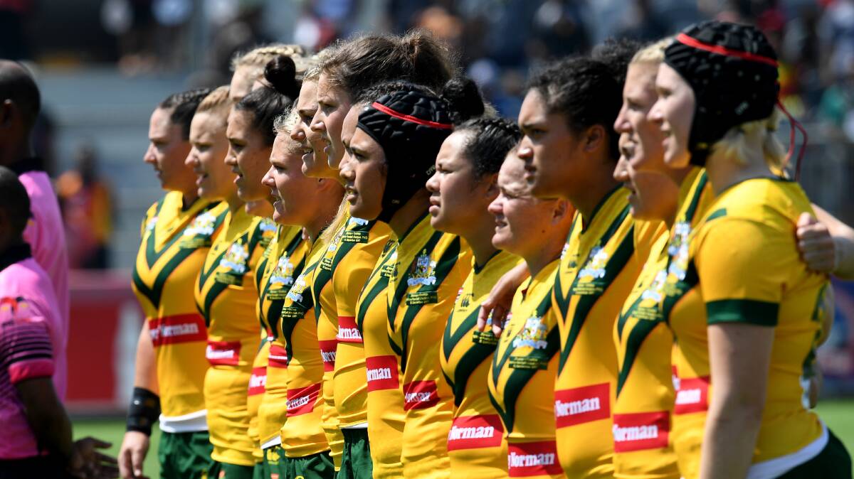 WORLD CUP BOUND: Vanessa Foliaki, pictured centre with head gear, has been named by Brad Donald in the Jillaroos squad. Photo: NRL Photos