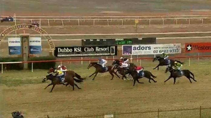 PHOTO FINISH: Sovereign Default (yellow) edges The Iceman for first place in the second at Dubbo on Saturday.