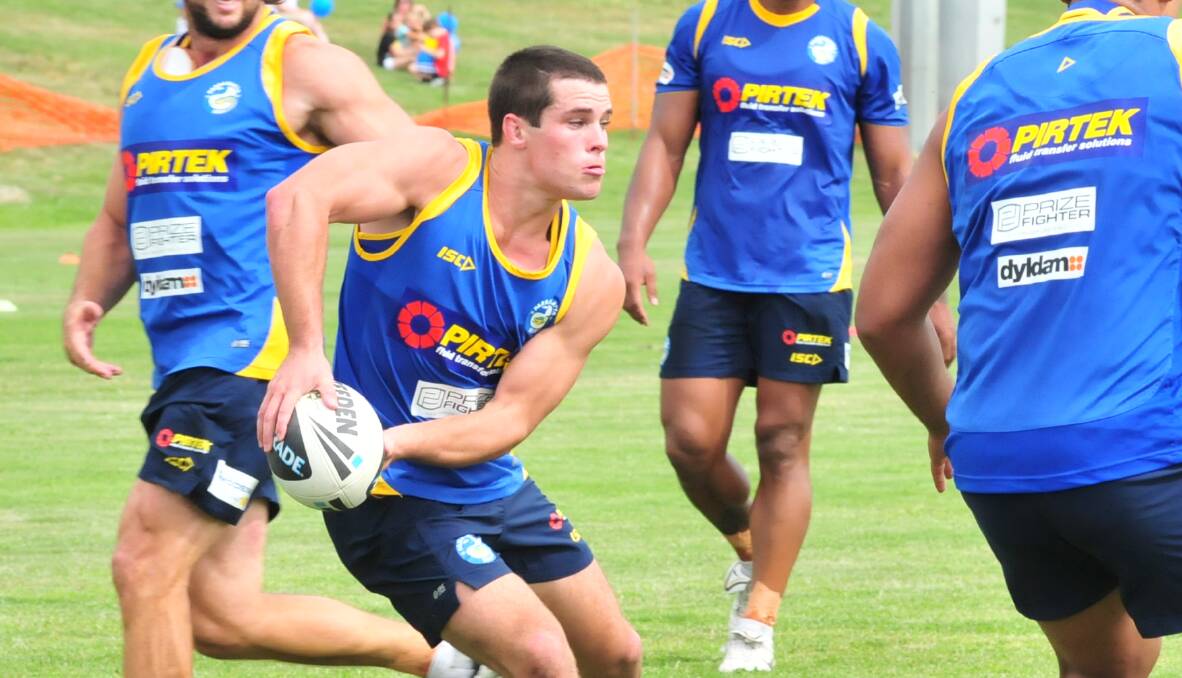 MORT AT HOME: Daniel Mortimer in action during a Parramatta Eels training session at Waratah Sportsground in 2011. Photo: JUDE KEOGH