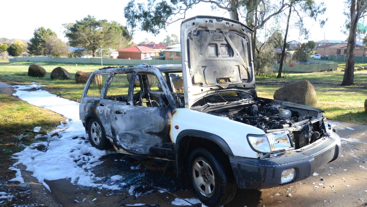 GONE: The burned out car on Richards Place. Photo: JUDE KEOGH