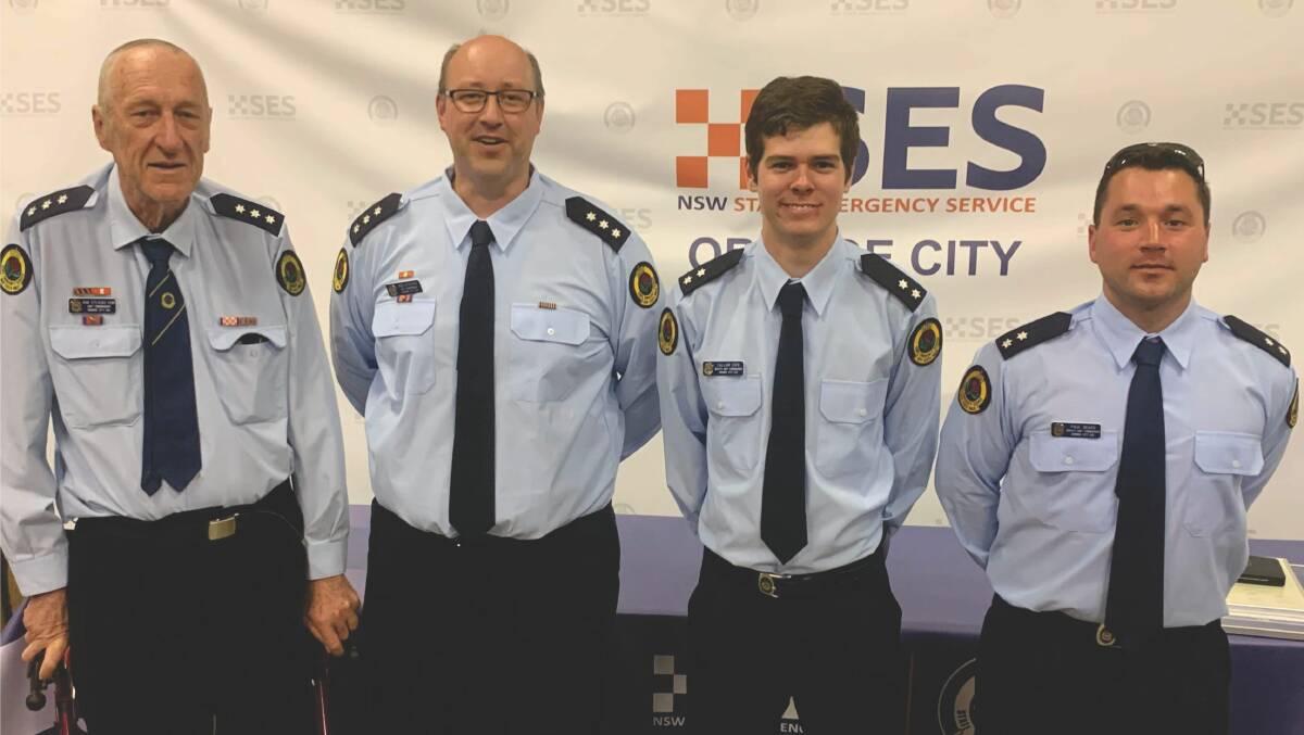 PROUD: Kim Stevens, Robert Stevens and NSW SES Orange City Deputy Commanders Callum Cope and Paul Beard. Photo: CONTRIBUTED 