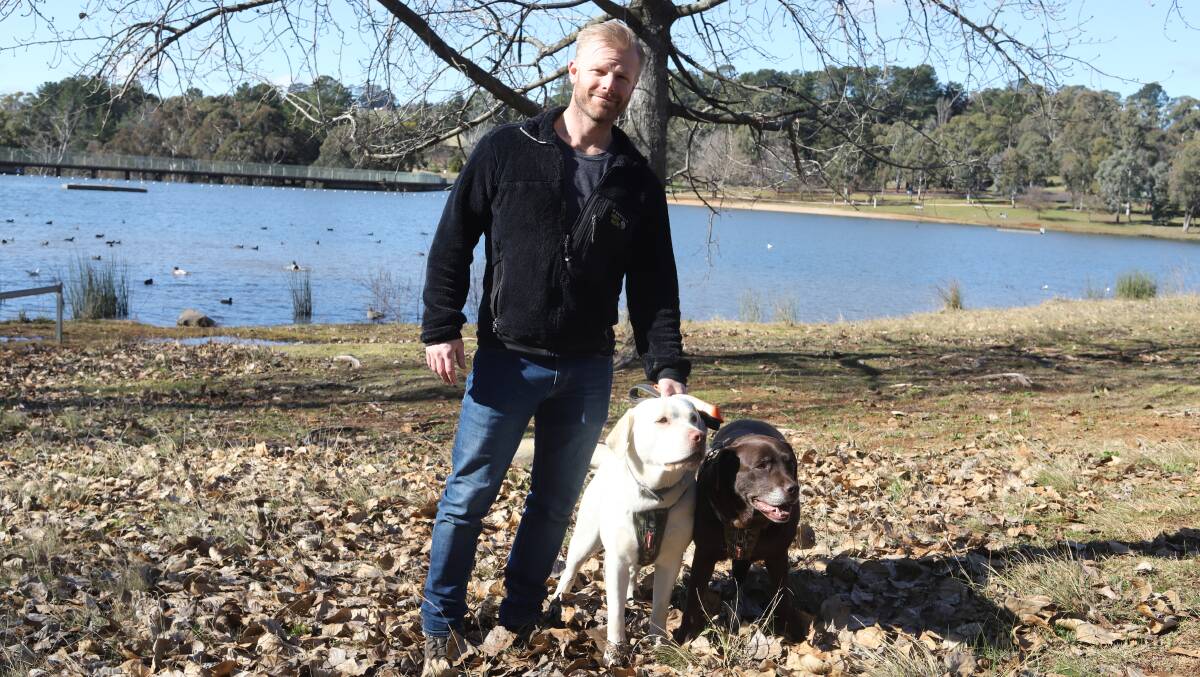 MAKING THE MOST OF THE SUN: Richard, Buddy and Coco Varvel at Lake Canobolas this weekend. Photo: CARLA FREEDMAN