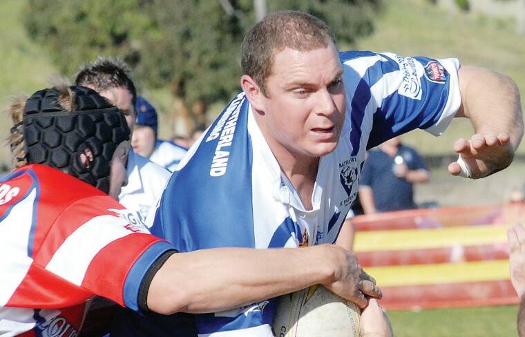 Mark Elliott looks to bust his way through the Mudgee defence. 