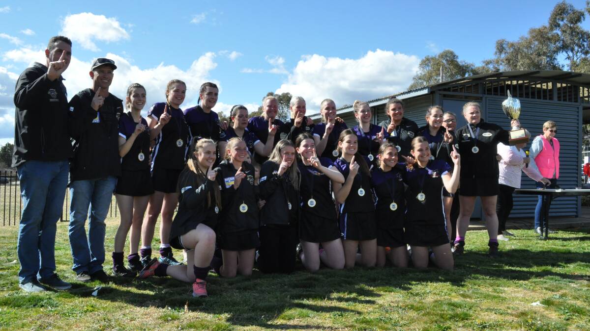 PANTHERS STRIKE: The Lithgow girls celebrated their first grand final win since 2016, coming from behind to beat CYMS on Saturday. Photo: JUDE KEOGH