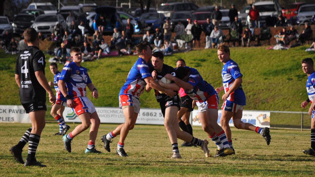 ON DECK: A record-breaking crowd was on hand at Pioneer Oval on Sunday to witness a pulsating Forbes-Parkes clash. Photo: NICK McGRATH