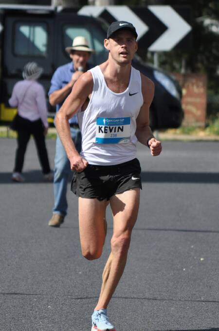 STRIDING OUT: Kevin Batt won the men's half marathon with a time of 1.06:53. Photo: NICK McGRATH