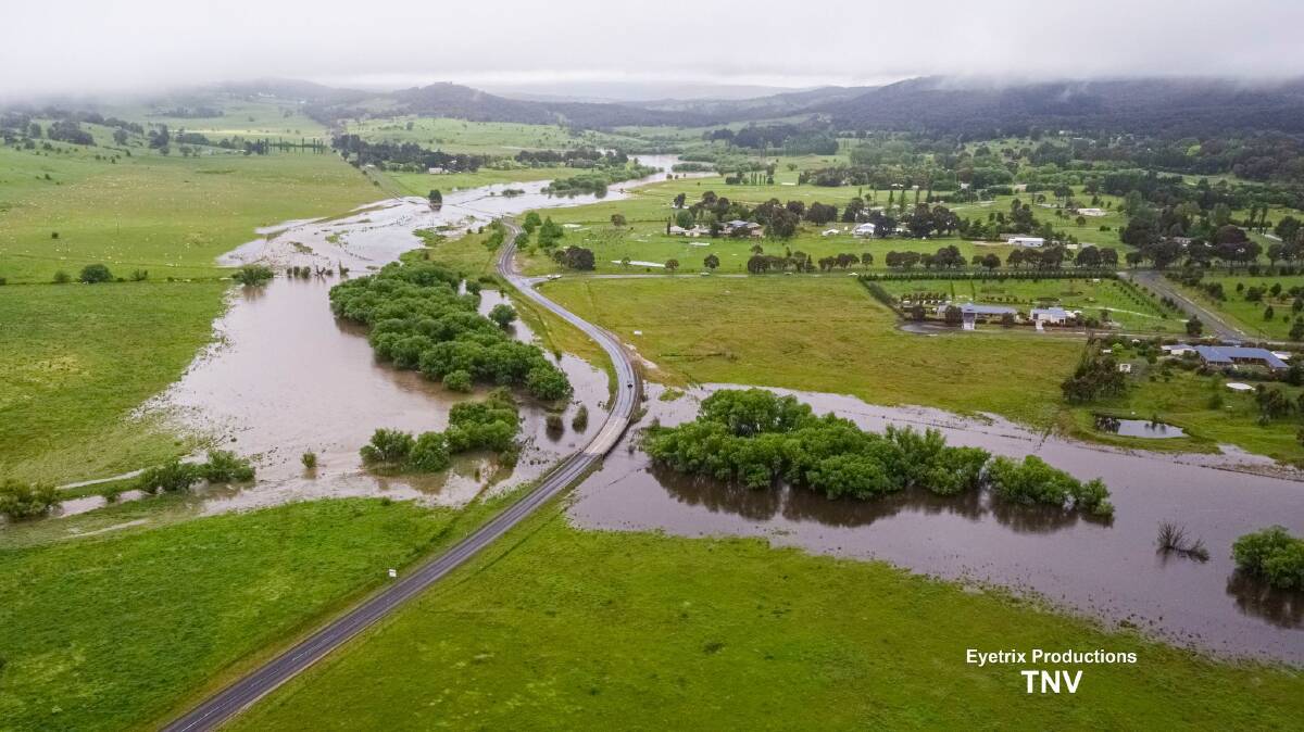 FLOOD: Water washes through the Clifton Grove area after spilling over Suma Park dam. Photo: TROY PEARSON/TNV