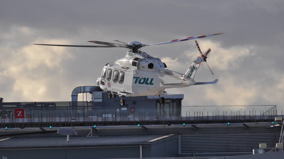 The Toll helicopter above Orange Hospital. Photo: NICK McGRATH