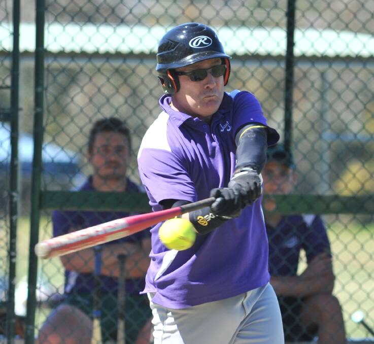 HITTING OUT: Just Us' big-hitting veteran Jim Gutterson lines up this pitch during his side's Orange Softball Association clash at Jack Brabham on Saturday. Photo: JUDE KEOGH