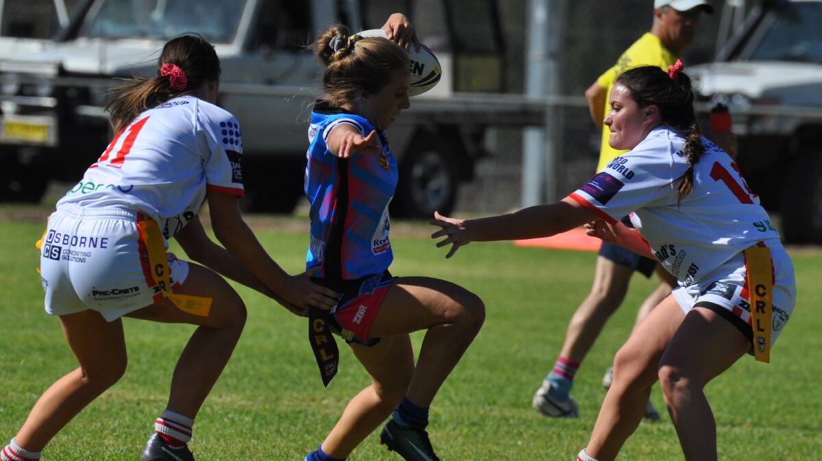 PREMIERS WIN THRILLER: The Cargo girls enjoyed a 16-14 win over Manildra in the league tag, with Sami Laing in the thick of it. Photo: NICK McGRATH