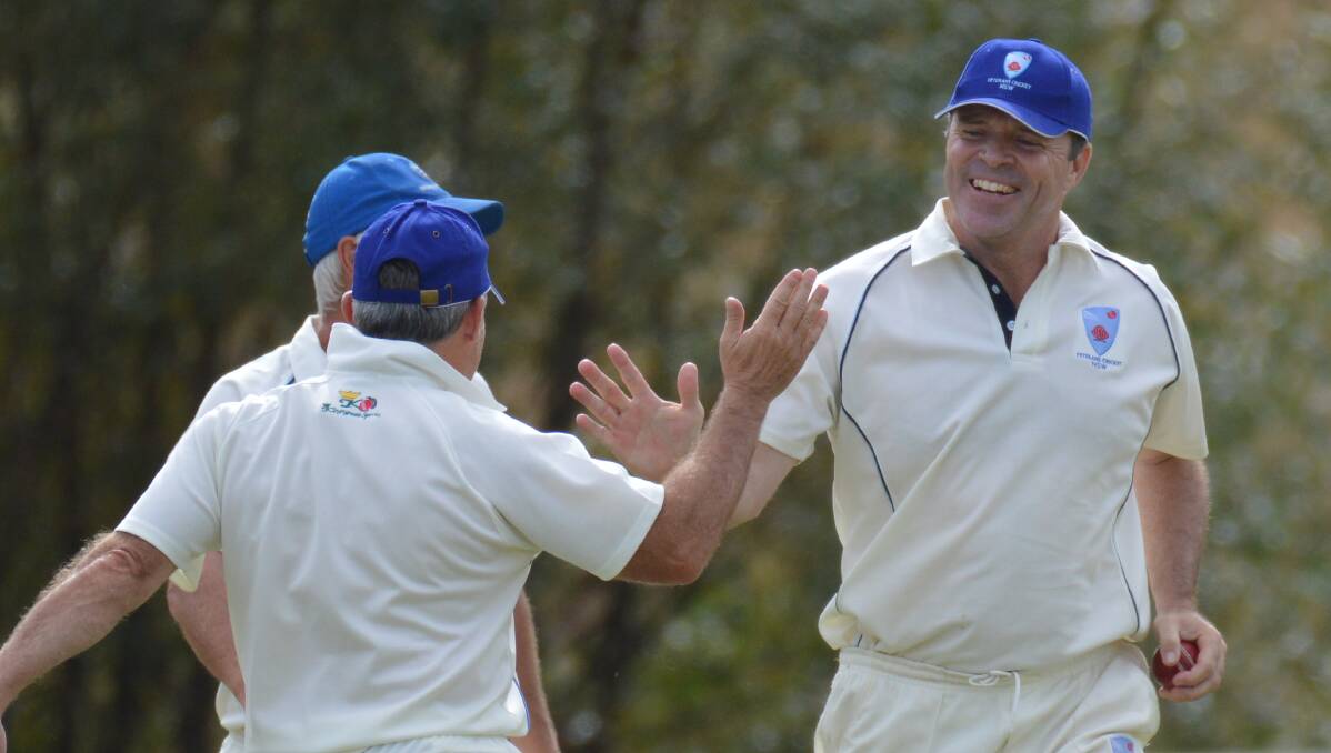 GOT HIM, GONE: Former Orange City skipper Bruce Tom celebrates taking a great catch in his NSW Kangaroos' division two final on Monday. Photo: MATT FINDLAY