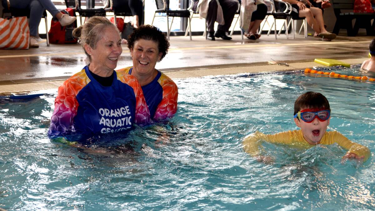 LOVING THE WATER: Theresa Fieldus swim therapist, Tanya Crowley swim instructor and Oscar Paine. Photo: CONTRIBUTED