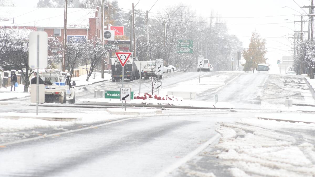 Snow covers Woodward Street on Thursday. Photo: JUDE KEOGH
