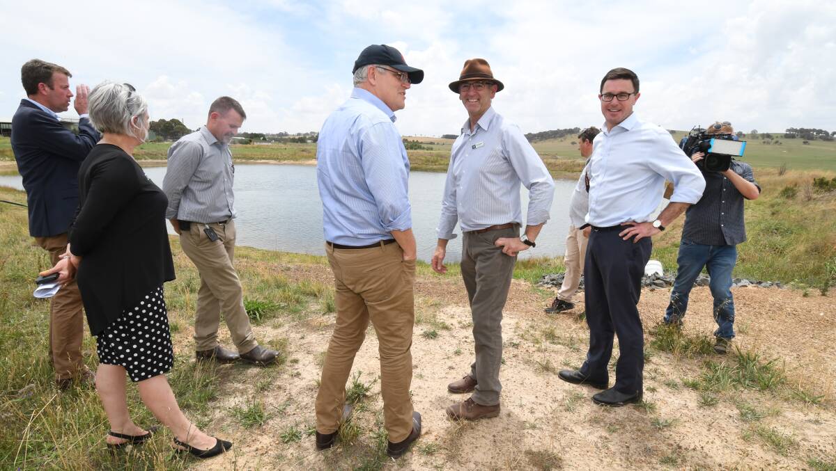 WATER WORKS: Prime Minister Scott Morrison, pictured alongside Blayney mayor Scott Ferguson and David Littleproud, was in the region on Tuesday. Photo: JUDE KEOGH