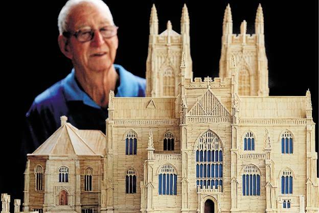 Match made in heaven: Norm Grundy with his latest matchstick model of St Andrew's Cathedral, Sydney. Picture: Chris Lane