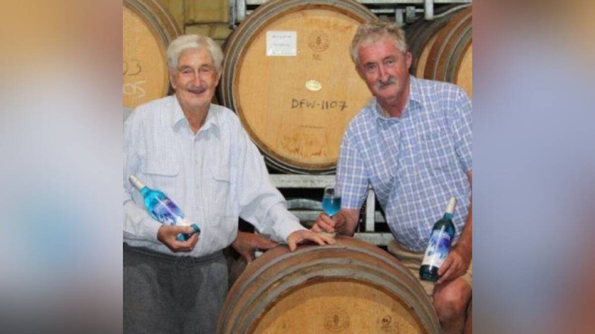 John Drayton, right, with his late father, Max, in the family's winery at Pokolbin.