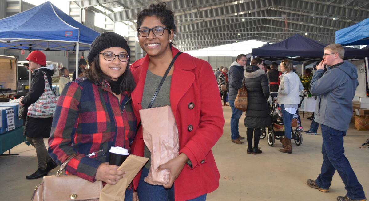 MARKET VISITOR: Dorothy Nathan, of Orange, brought friend Dr Maddy Jega from Bathurst, to the Orange Farmers Market so she could try and buy farmers market produce that was grown or made in the region and see what Orange has to offer. Photo: TANYA MARSCHKE