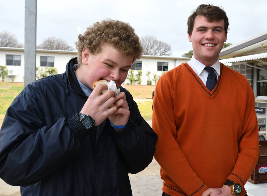 Students at Orange Anglican Grammar School showed their support for drought affected farmers with a fundraising barbecue. Photos: JUDE KEOGH