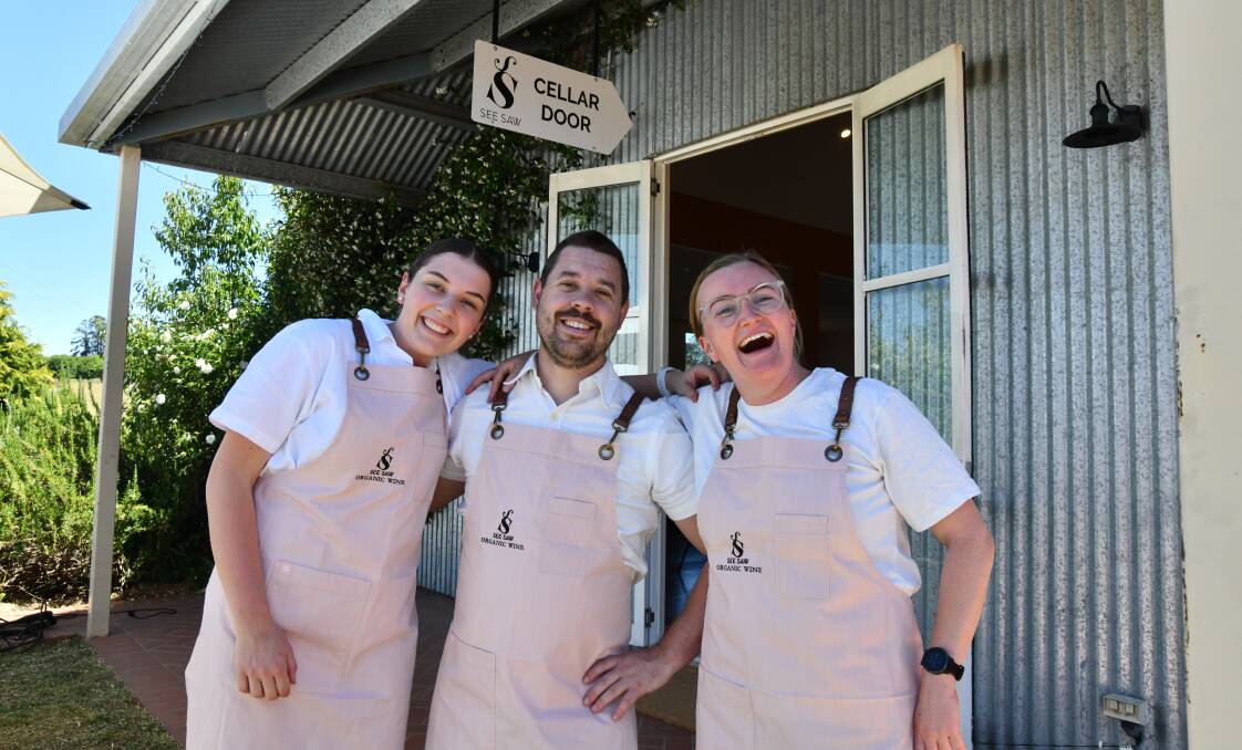 Alice Jarrett, Matthew Eustis, Gaby Steer are ready to open the See Saw Wines cellar door at Lake Canobolas Road. Picture by Carla Freedman