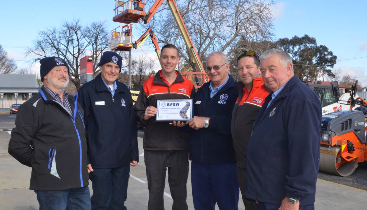 GRATEFUL: RFS volunteers thanked staff from Kennards Hire for their support, from left Greg Lee, Phillip Baer, Charlie Wollaston, Geoff Ryan, Luke Compt and Errol Hockley. 