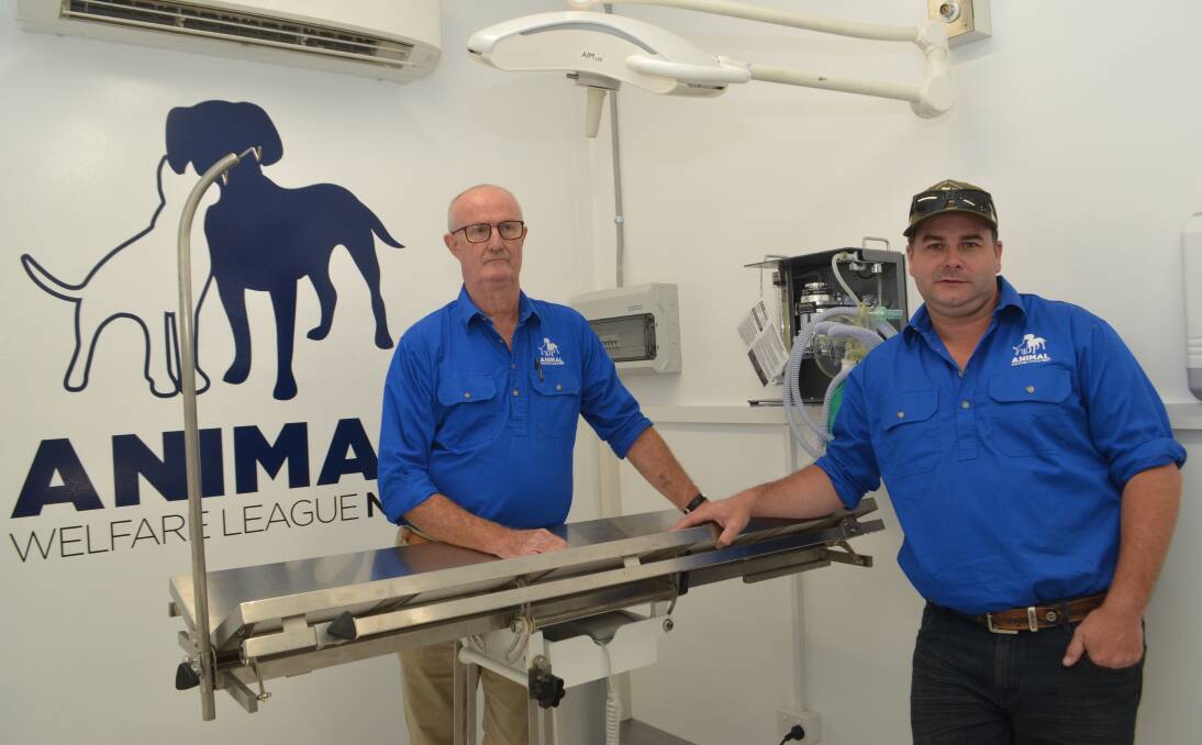 ON THE ROAD: Animal Welfare League NSW president David Hope and mobile vet clinic manager Daniel Naethuys inside the surgery. 