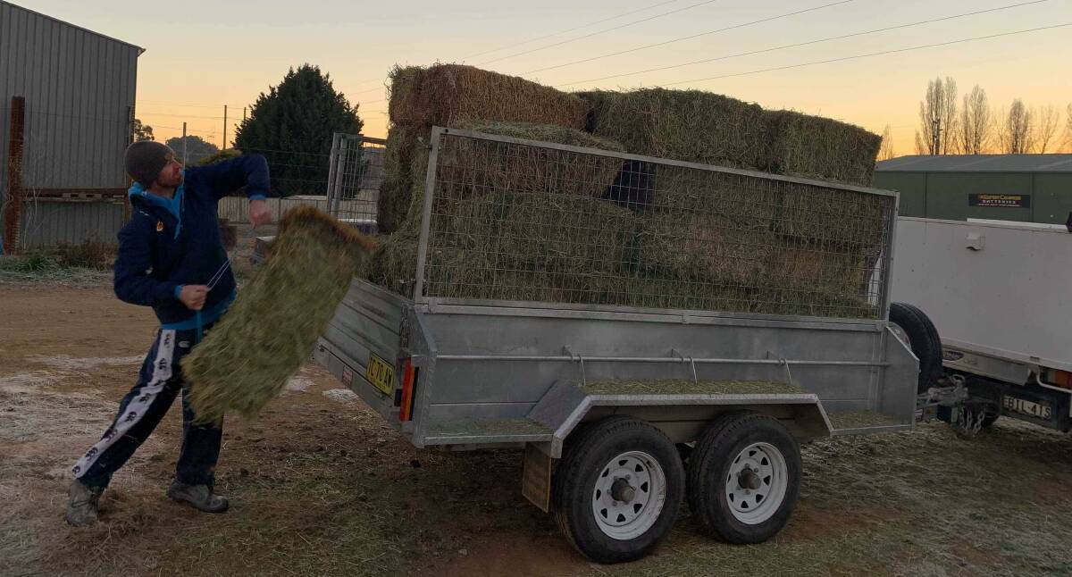 Mitch Kennewell from Feed4Farmers donated hay to farmers on Saturday. 
