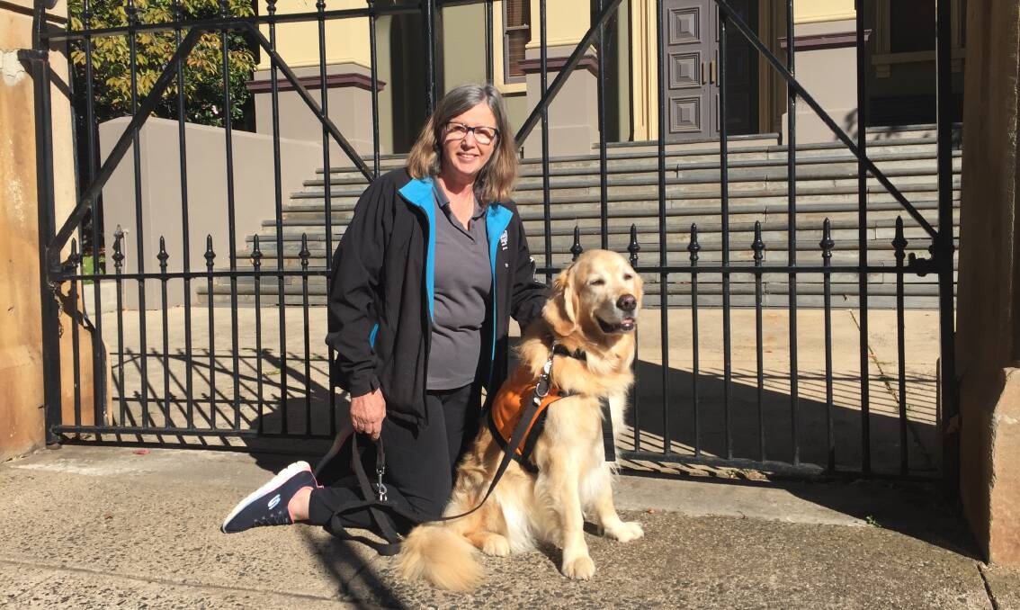 PET THERAPY: Canine Court Companion Program Pet Therapy volunteer Pam Davis and Bono who visits the courthouse each week.