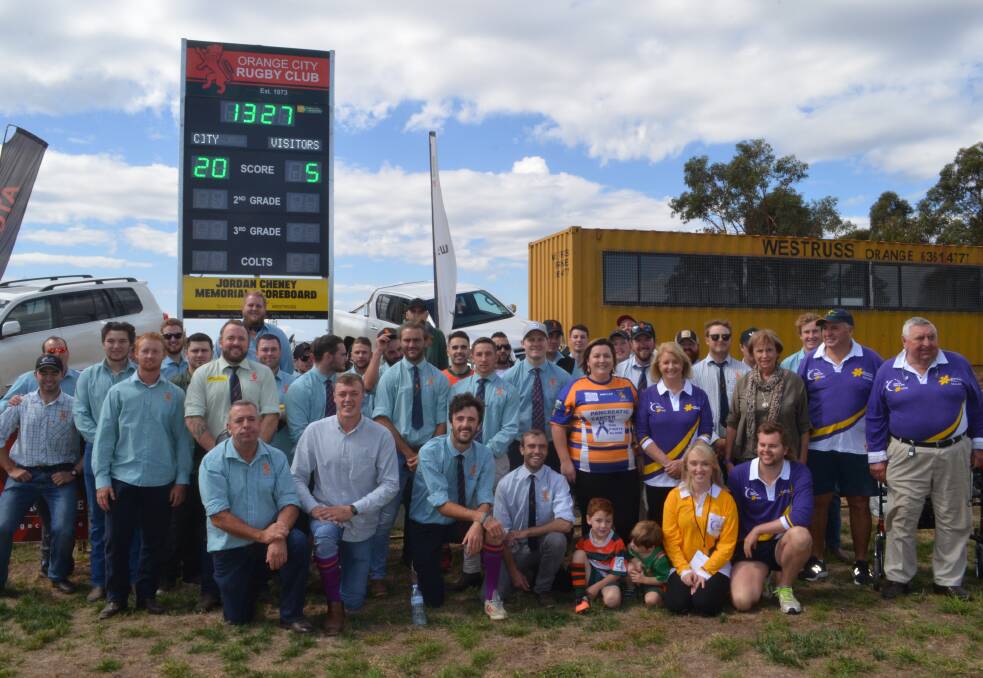 NOT FORGOTTEN: The Orange City first grade side and family members of Jordan Cheney unveiled a scoreboard in his name at Waratahs Sports Ground on Saturday. 