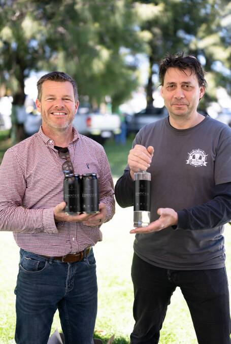 SYMPATICO: Badlands head brewer Jon Shiner of Orange and Stone Pine head distiller Ian Glen from Bathurst have worked together to create Sympatico beer and gin. Photo: SUPPLIED