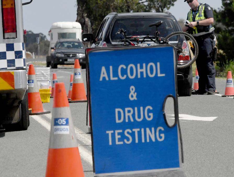 OVER THE LIMIT: A disqualified driver tried to avoid a stationary road-side breath testing site by parking and walking past. FILE PHOTO