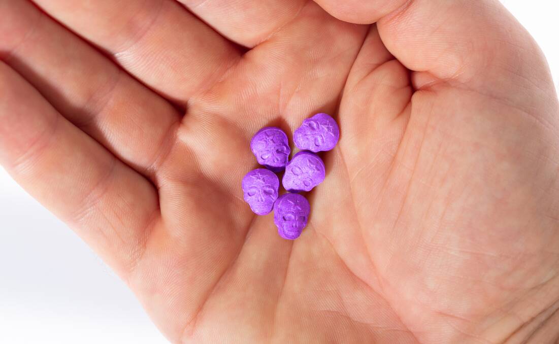 IN COURT: A 19-year-old man was found in possession of 17 MDMA pills after he drove past police at 4am without his headlights on. Photo: SHUTTERSTOCK