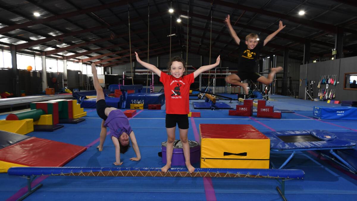 GIVING BACK: Emmison Shapland, Millie and Brock Waters at Central West Gymsports which will hold a fundraiser for Cafe Latte on Friday. Photo: JUDGE KEOGH