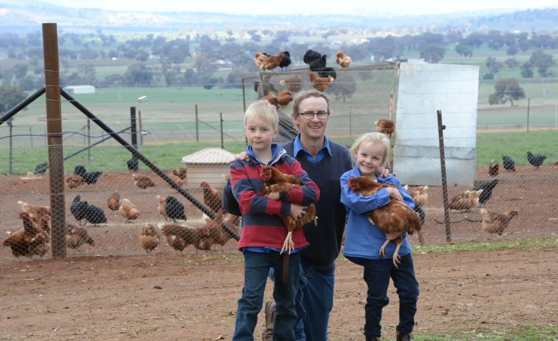 PRODUCER: Rodger Shannon of Carbeen Pastured Produce with his children Charlie and Willamina last year, he is selling products online. Photo: RACHAEL WEBB