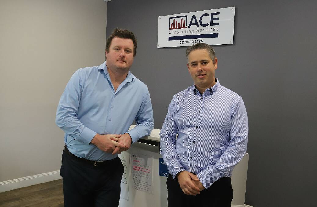 FINANCIAL GURUS: Ace Accounting Services partners Dan Casson and Gary Holway. Photo: CARLA FREEDMAN