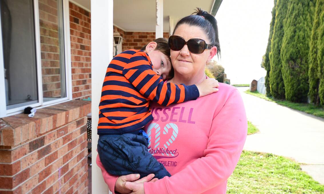LOCKED OUT: Tina Follett with her four-year-old son Braxton Shean has been homeless for months during which time the family has been bounced around motels and emergency housing. Photo: JUDE KEOGH 
