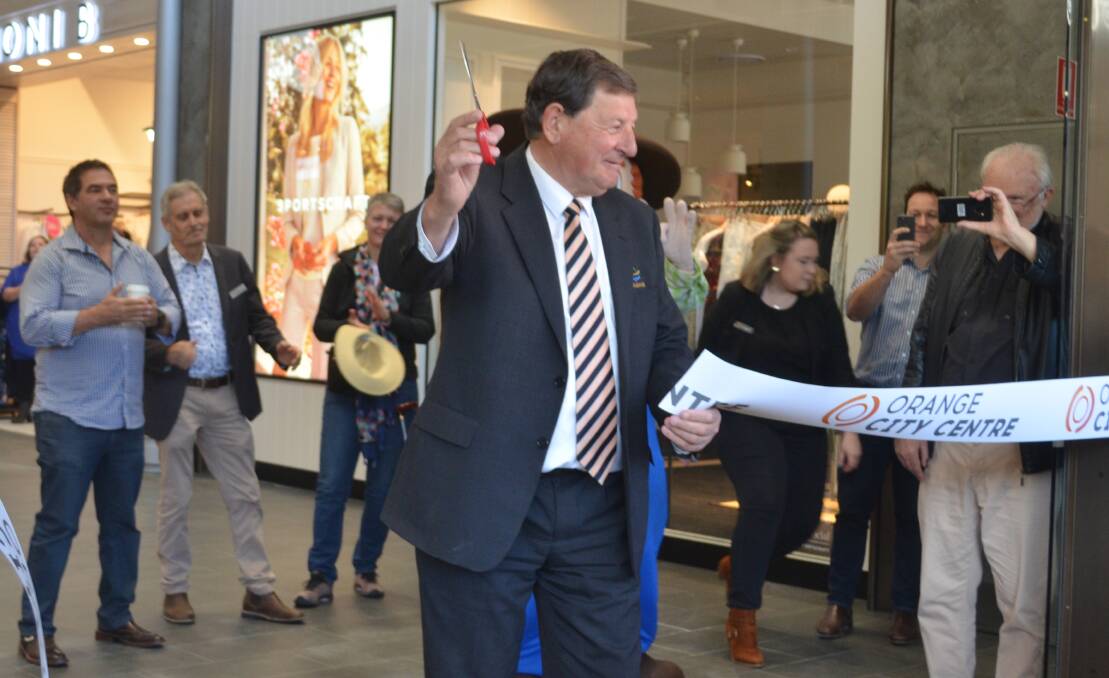 OPEN: Mayor Reg Kidd cut the ribbon, with support from councillors Tony Mileto, Stephen Nugent and Joanne McRae, for the reopened Dalton Brothers section of the Orange City Centre on Saturday morning. Photo: TANYA MARSCHKE