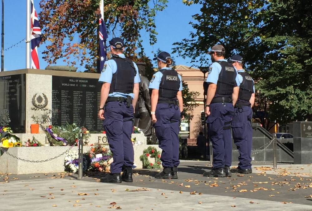 COMMEMORATION: Four Orange Police officers laid a wreath on Saturday. 