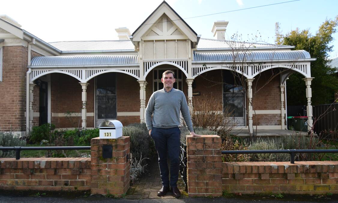 UP AND RUNNING: Book Regional owner Peter Bromley outside one of the short-stay houses he manages. Photo: JUDE KEOGH