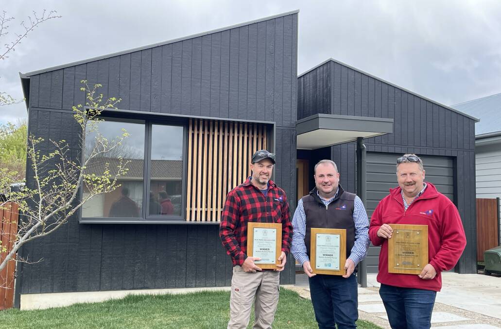 Banksia Building Pty Ltd foreman Chris Holmes, manager Ben Barrett and director Mick Banks outside 24 Hales street, which earned them the Residential Builder of the Year Award 2023. Picture by Tanya Marschke