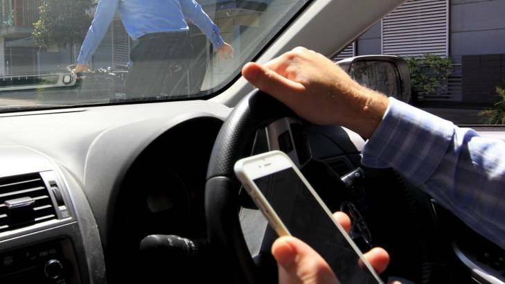 DETERRENCE NEEDED: Two drivers were convicted in court after a road-side camera detected them driving with mobile phones in their hands. File photo: SHUTTERSTOCK